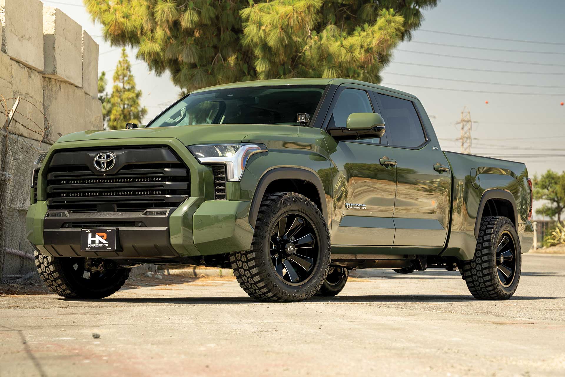An image of an army green Toyota Tundra on RBP Repulsor M/T RX tires