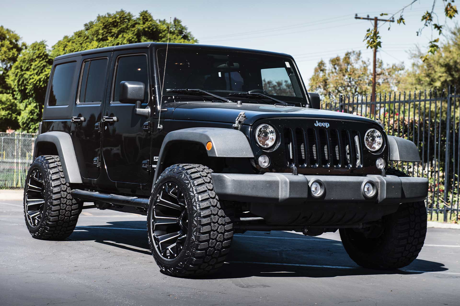 An image of a black Jeep Wrangler on RBP Repulsor M/T tires