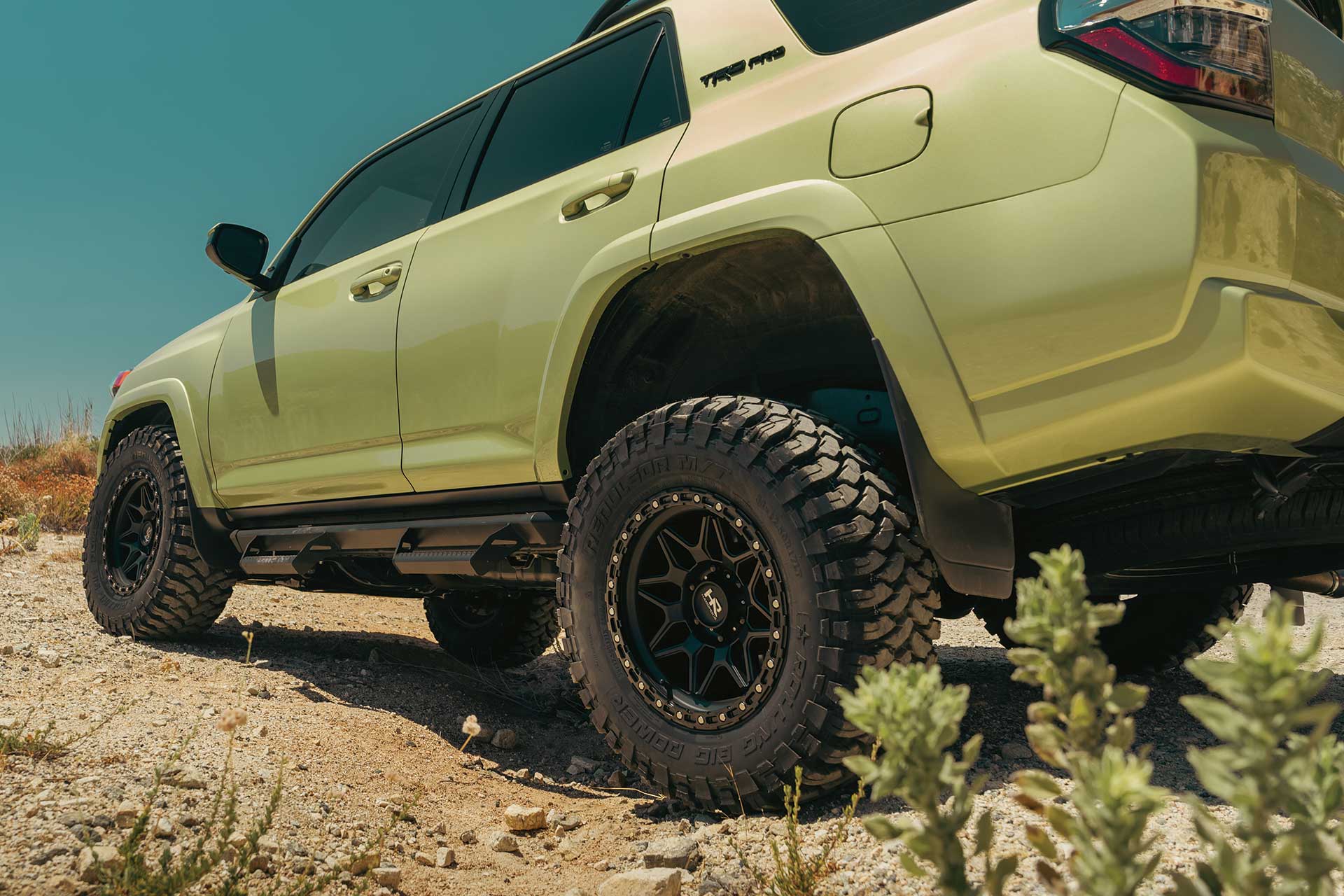 An image of a lime rush Toyota 4Runner on RBP Repulsor M/T tires