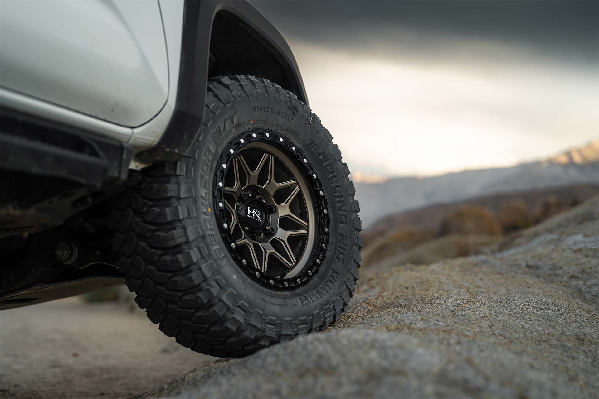 An image of an overland Toyota Tacoma on RBP Repulsor M/T tires